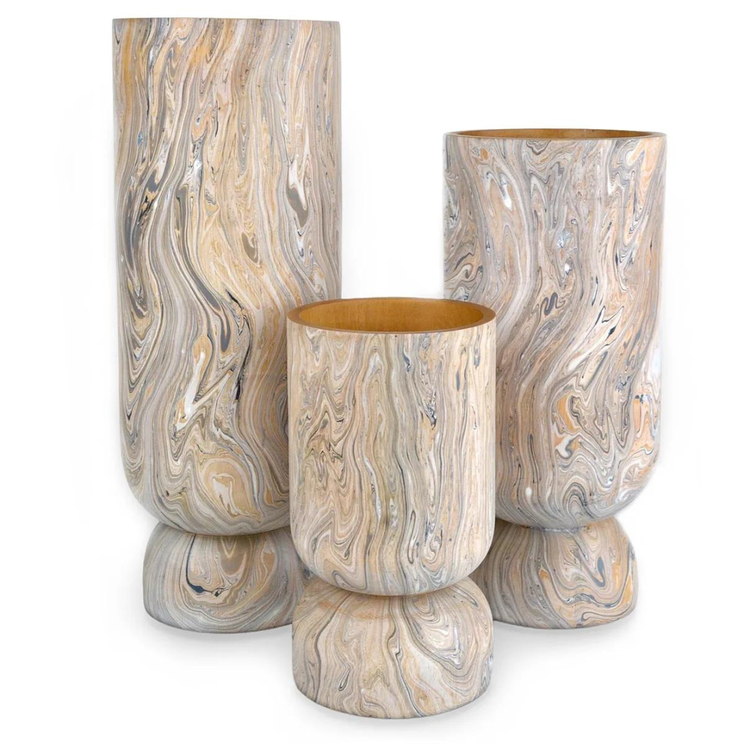 All three sizes of the Sunrise Vase are displayed here. 