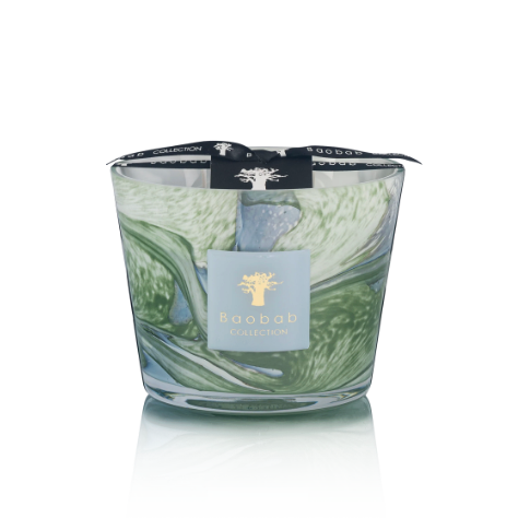 The Leaves Marius Candle by Baobab is a decorative hand-blown glass candle with green and white swirls, inspired by Provence, and finished with a signature Baobab ribbon.
