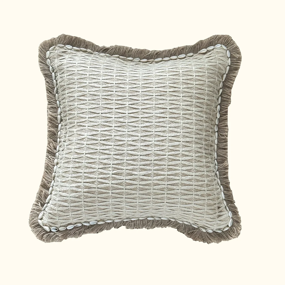 The Jute Weave Pillow 20 x 20 by Threads Soft Goods features a textured jute surface, brown fringed edges, and a border of white seashells—perfect for adding summer chic to any space. Shown on a plain, light background.