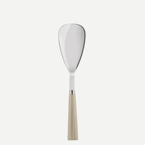 The Sabre Nature Rice Spoon features a wide, flat oval stainless steel blade and a light wooden handle, ideal for matching with flatware, displayed on a plain white background.