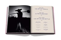 An open copy of The Art of Tequila showing a black and white photograph of a person carrying a tool in a field on the left page and a table of contents listing three parts and various chapters on the right.