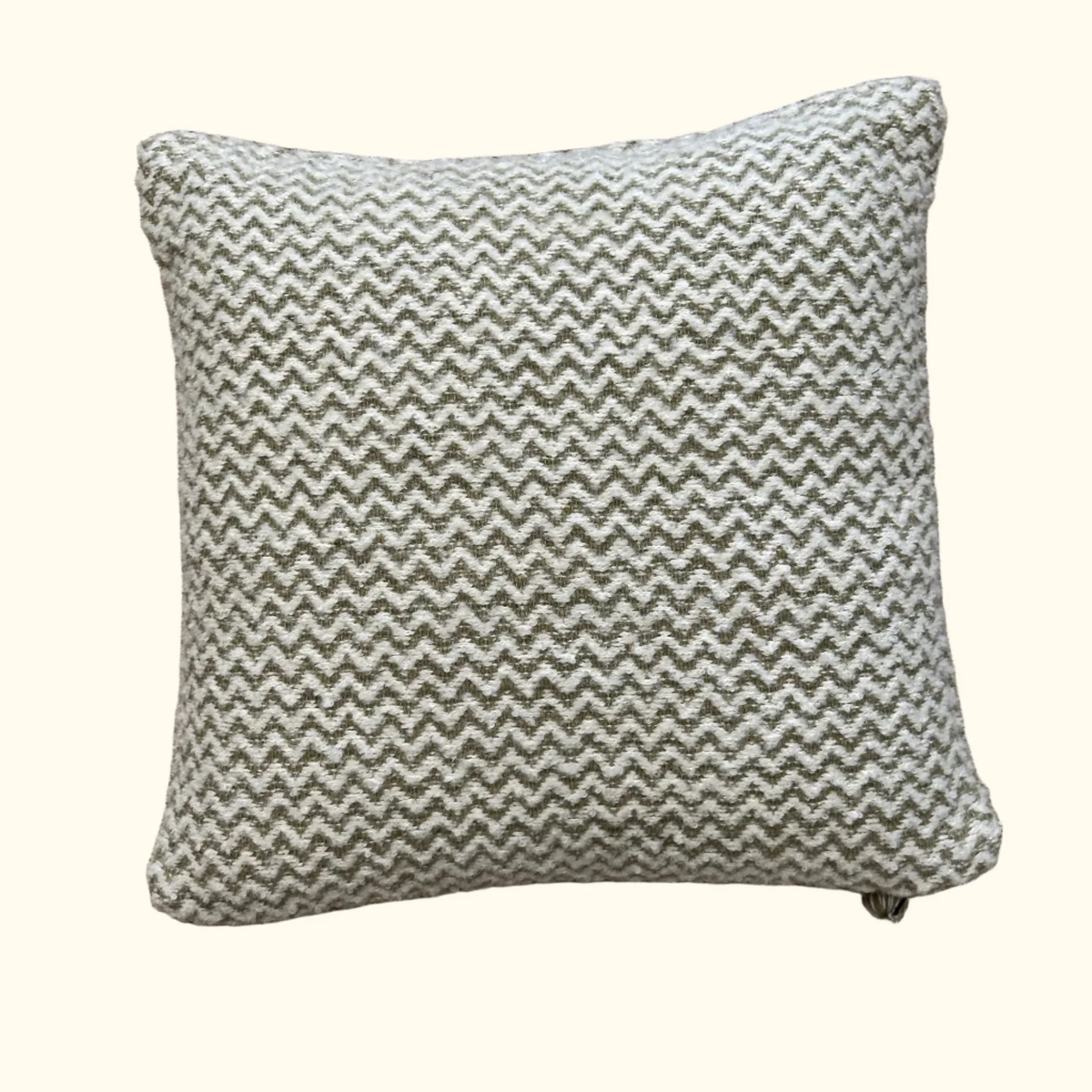The Chevron Pillow Sage 22 x 22 by Threads Soft Goods features a gray, white, and sage green geometric design for a stylish accent.