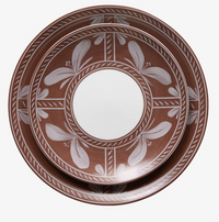Two stacked, hand-painted round Sevilla Dinnerware Brown plates featuring a white center and a white floral pattern around the rim.