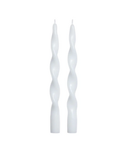 Two white Zodax Brilliance Twist Candle Set 2- taper candles with a spiral, twisted design for artisanal home décor.