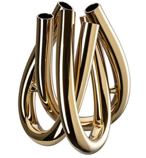The Trui Vase by Rosenthal features five smooth, curved tubular forms that loop and intertwine, finished with a lustrous PVD coating for a modern, reflective look reminiscent of abstract gold sculpture.