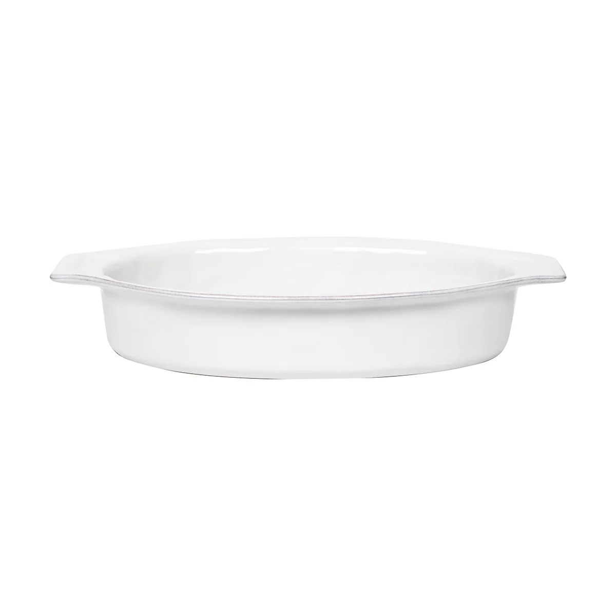 The Juliska Puro Oval Baker Whitewash 16″ is a white, oval ceramic baking dish made from durable Portuguese stoneware, featuring handles on both sides and ideal for holiday entertaining, shown against a plain white background.