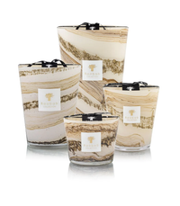 Four hand-blown Sand Siloli candles by Baobab feature beige, brown, and white swirls and a gold tree logo on a white label. Each emits a refreshing citrus scent, displayed against a white background.