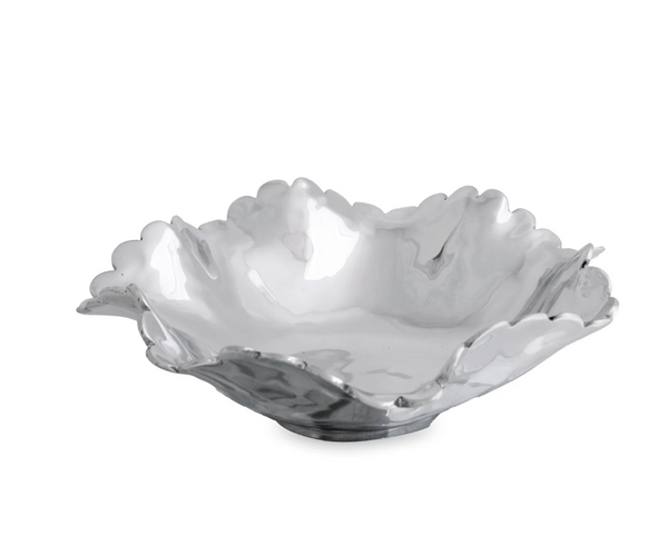 The Beatriz Ball Vento Colette Bowl - Medium is a shiny, silver square aluminum serving bowl with scalloped edges and a reflective surface—ideal as a decorative centerpiece.