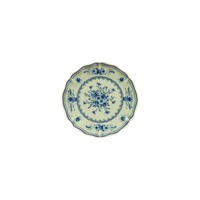 A round, scalloped-edge Vila Olive / Blue plate in light green with a blue floral pattern in the center and along the rim.