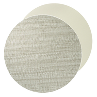 The Bodrum Izmir Placemat Round s/4 set features two stacked mats: the top displays a textured, woven gray design, while the bottom placemat is smooth and plain in an off-white shade.