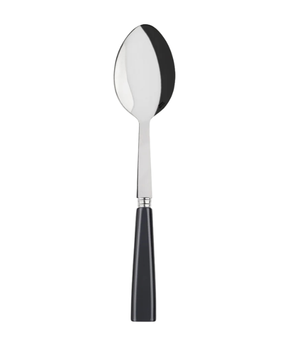 Spoon with black handle on a white background