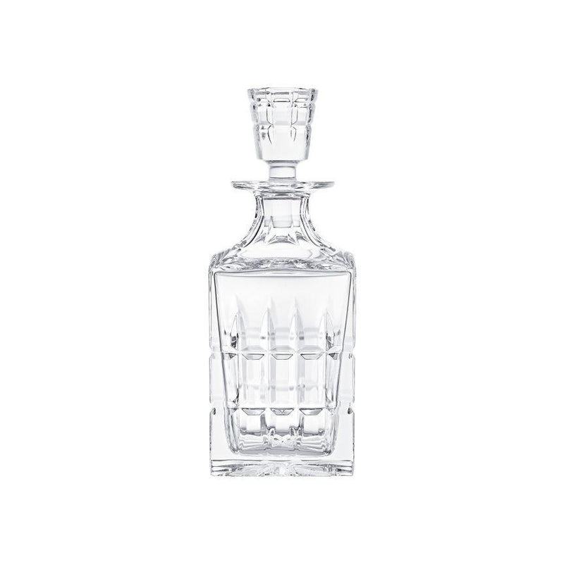 The Manhattan Square Decanter by Saint-Louis/Hermes is a clear, crystal decanter with a matching stopper and vertical geometric cuts, creating an elegant look against a plain white background.
