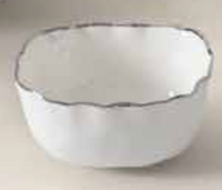 The PAMPA BAY Portofino Plata Bowl is a medium white porcelain serveware bowl with a scalloped rim and delicate silver trim, shown on a light surface.