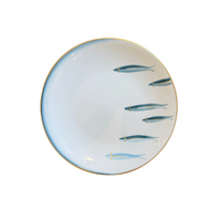 A round white porcelain plate with a blue painted border and six blue fish illustrations, finished with a thin gold rim, shown on a plain white background.