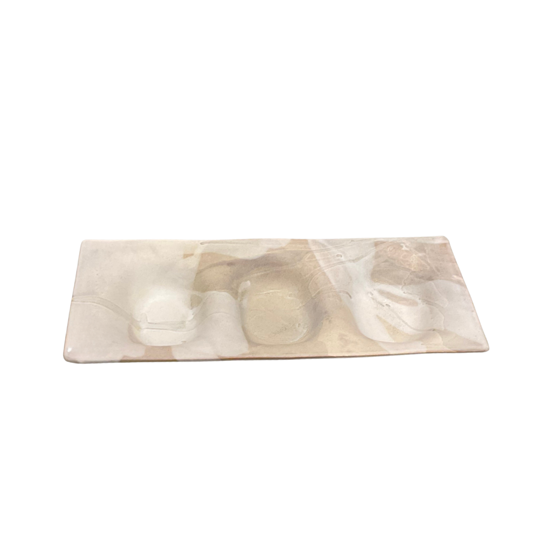 The Three Part Stone Rectangle Platter by Alex Marshall Studios features shallow compartments and a marbled beige and white design on handmade ceramic, offering a smooth, elegant surface.