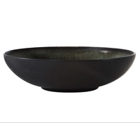 The Tourron Samoa by Jars - Rosenthal is a black, round, shallow handmade ceramic dinner plate featuring a smooth matte finish and slightly angled sides, displayed against a white background.