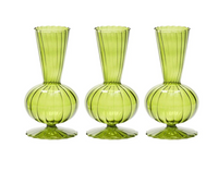 The Kim Seybert Tess Bud Vase Set of 3 in Olive features identical hand-blown vases with vertical stripes, bulbous bases, and flared rims, arranged side by side against a white background.