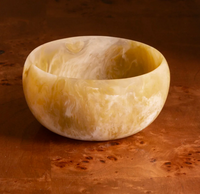 The Beatriz Ball Resin Sorbet Mini Bowl in Matcha features a unique marbled pattern in green tones, making it a standout piece of tableware for any setting.