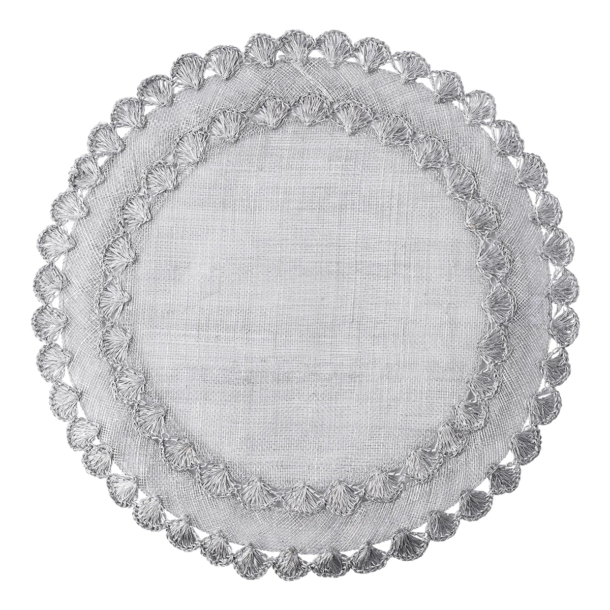 The Isadora Placemat Set of 4 by Juliska features round, light gray linen placemats with decorative scalloped edges and intricate embroidered patterns.