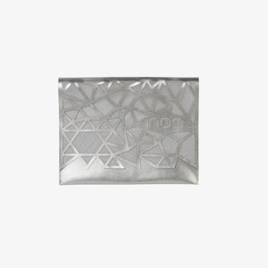 The Geometric Afikoman Bag by Apeloig Collection features a silver metallic finish with an abstract geometric cut-out pattern, ideal as modern Passover decor or a stylish Star of David gift, shown on a plain white background.