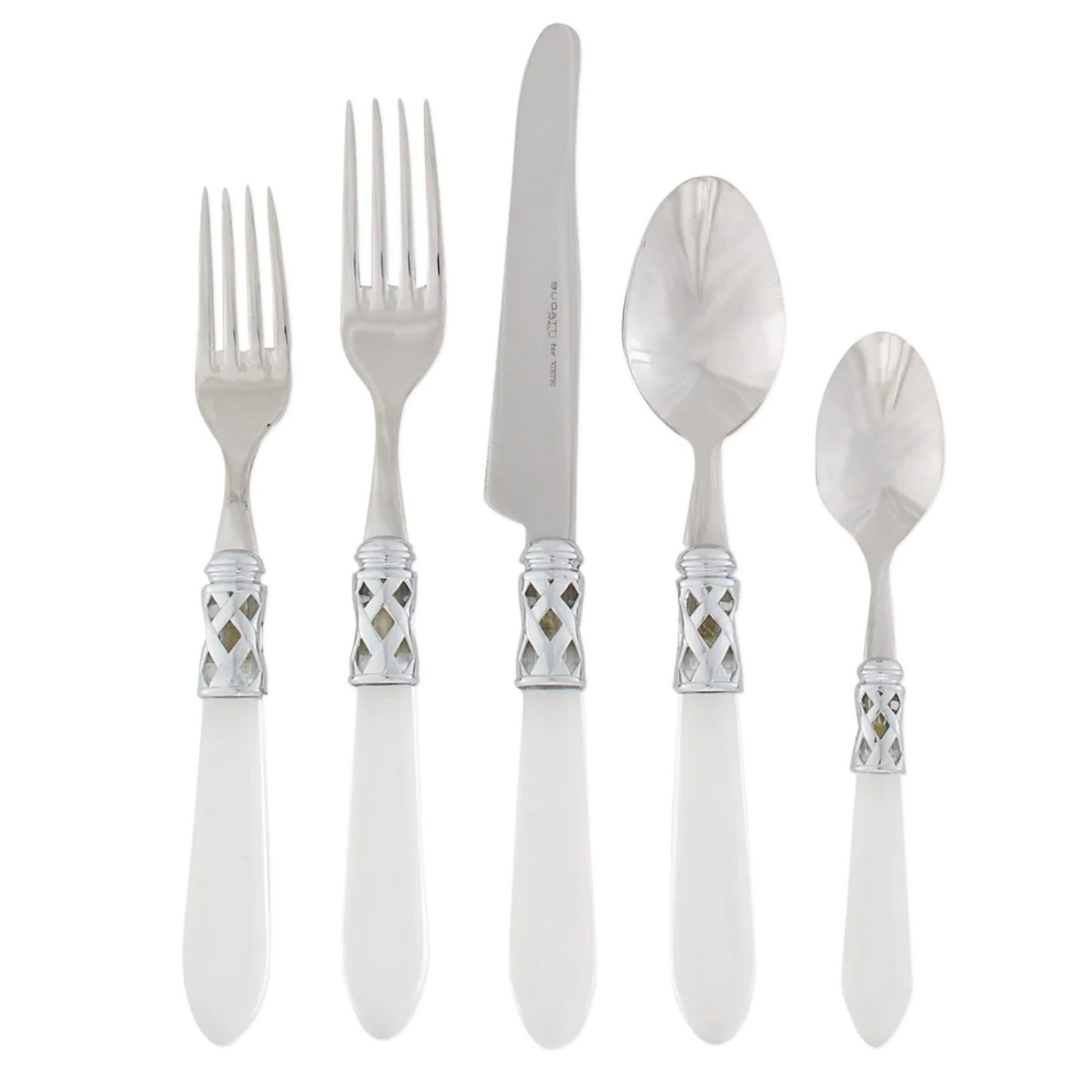 Clear handle and stainless steel flatware. 