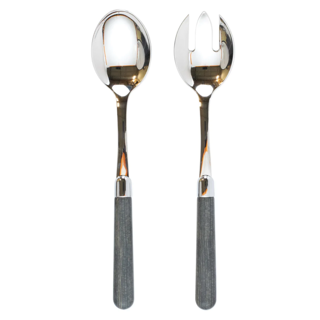 This salad server set is made of stainless steel and features acylic grey wood handles. 