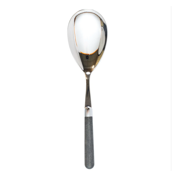 The albero serving spoon is made of stainless steel and features an acrylic wood handle. 