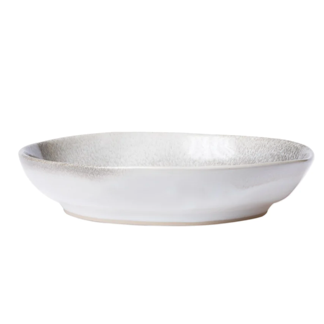 The aurora pasta bowl features an ash-like design, and is made of stoneware. 