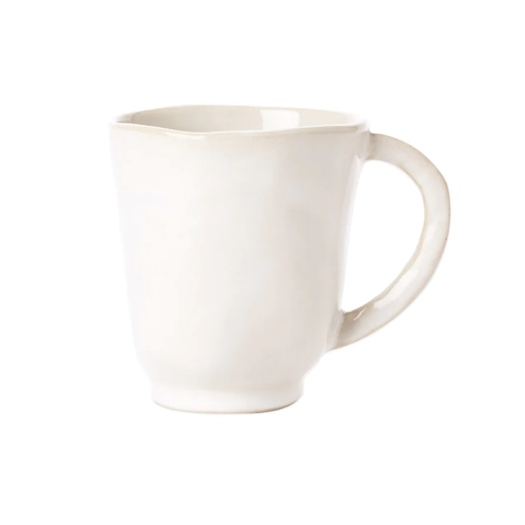 The forma cloud mug features an organic white stoneware design. 
