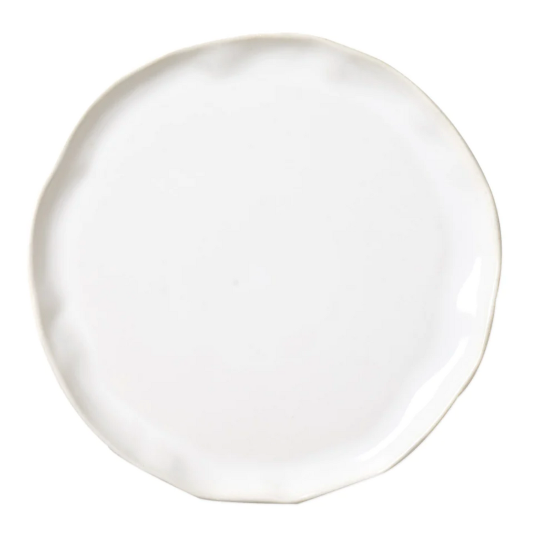 Design to have a cloud-like appeal, this dinner plate is white and made of stoneware.