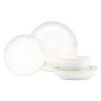Stoneware dinnerware set featuring a cloud-like design. 