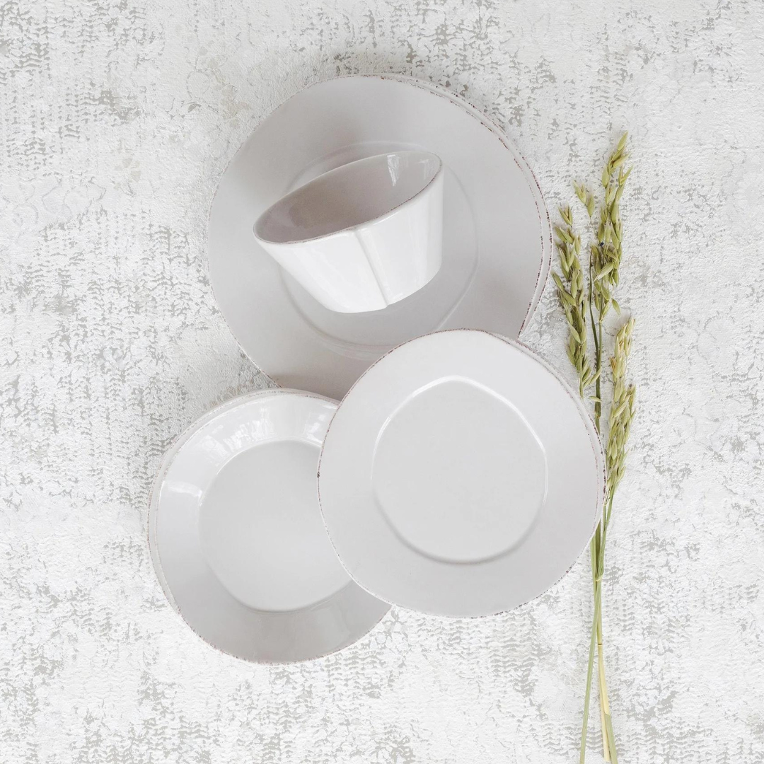 Lastra stoneware dinnerware set. Includes salad, dinner plate, and mug, as well as pasta bowl. 