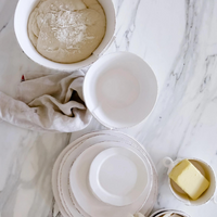 Made of premium white durable stoneware, the stacking bowls are timeless. 