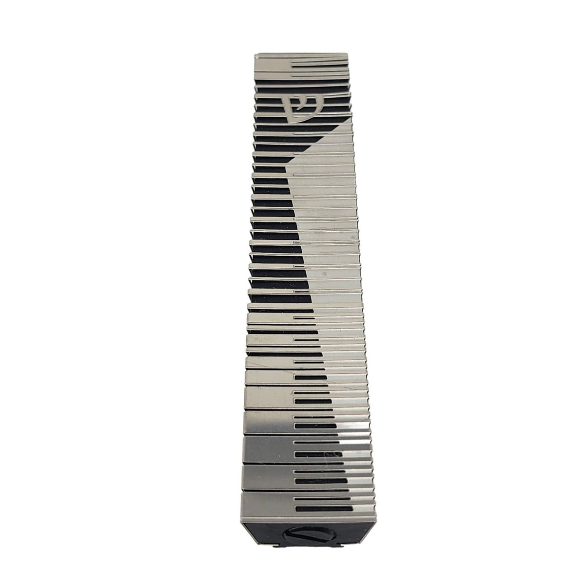 Piano inspired Mezuzah in black and silver in extra small. 