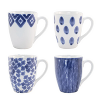 The santorini mugs are designed with blue patterns and made of ceramic. 