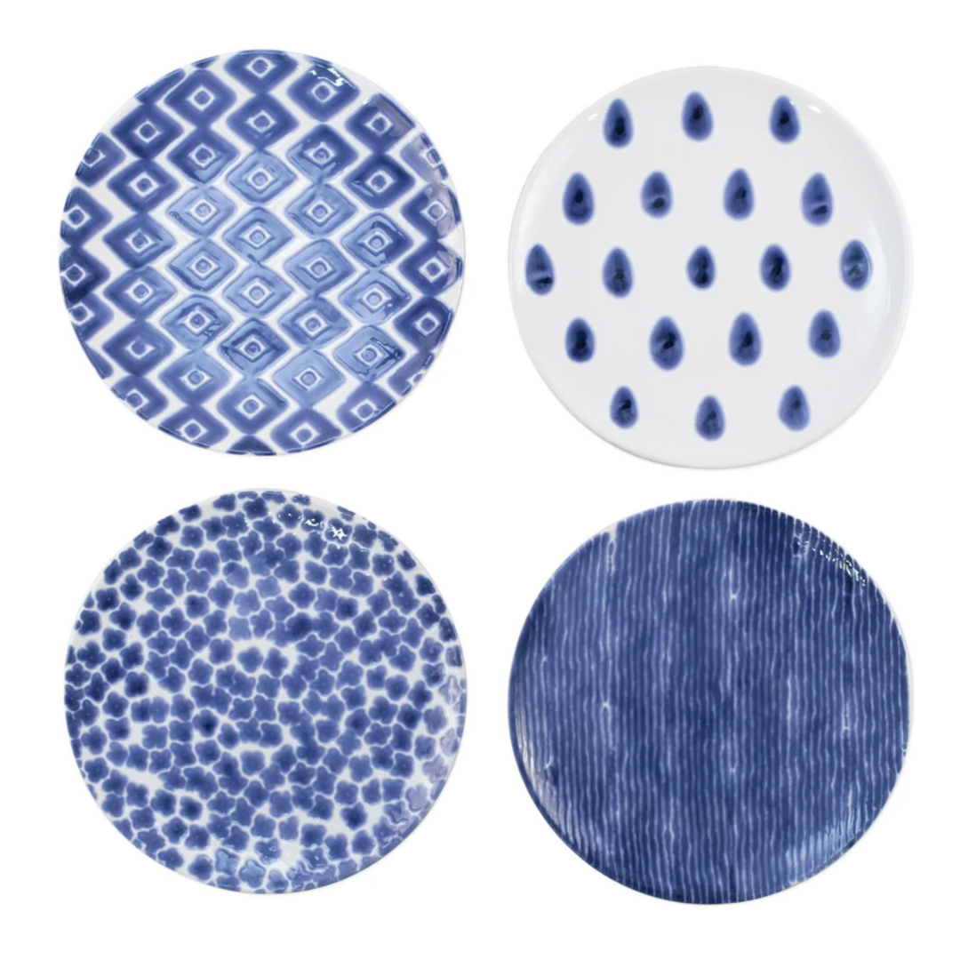 These salad plates are crafted in ceramic and display blue designs within these salad plates. 