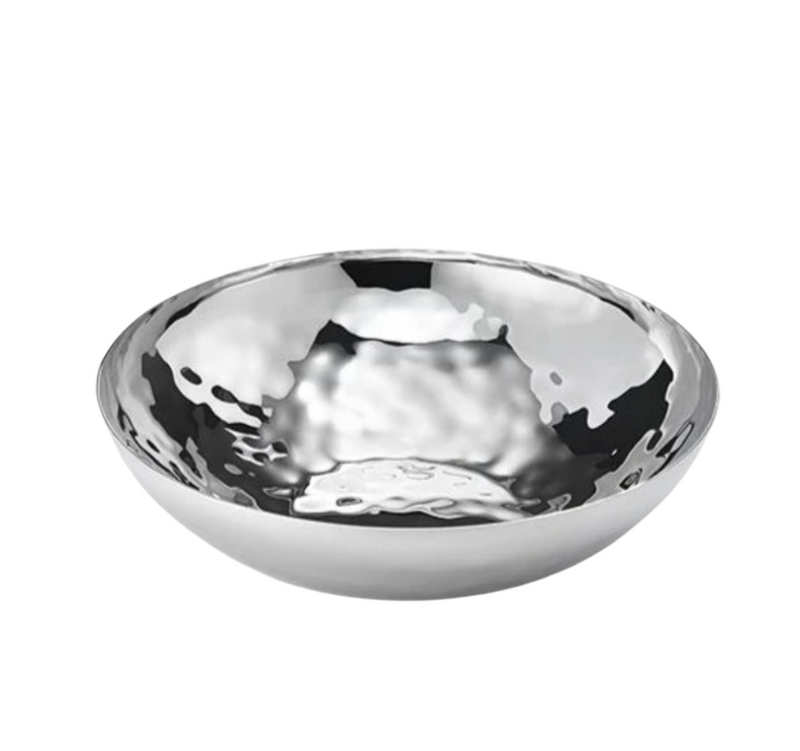 The Luna Serving Bowl 8" by Mary Jurek is a round, shallow stainless steel bowl with a hammered, reflective surface. Modern, stylish, and dishwasher safe, it’s shown on a white background.