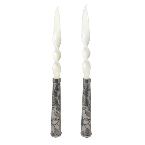 Metal lace candleholders with white twist candles. 