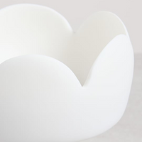 Flower-inspired fleur footed centerpiece bowl.