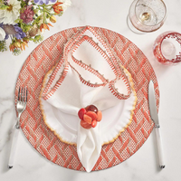 Knotted edge napkins in white, natural and orange. 