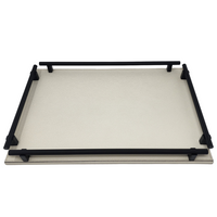 Large cream leather tray with four black burnished handles. 