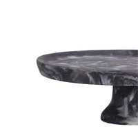 Black swirl resin cake footed plate. 