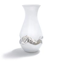 The oro silver vase is made of white ceramic and has hand painted silver at the center. 